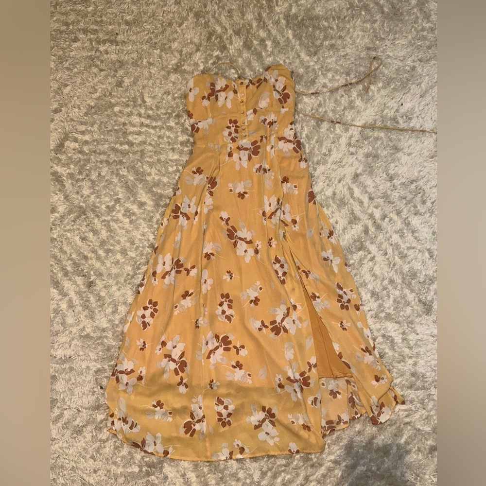 Abercrombie and Fitch dress, strings around shoulder to tie, slit on left leg,